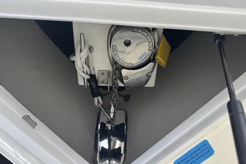 Slide: The Image of Interior of a 2015 Cobalt R7 boat with leather seating and wood accents. - 9