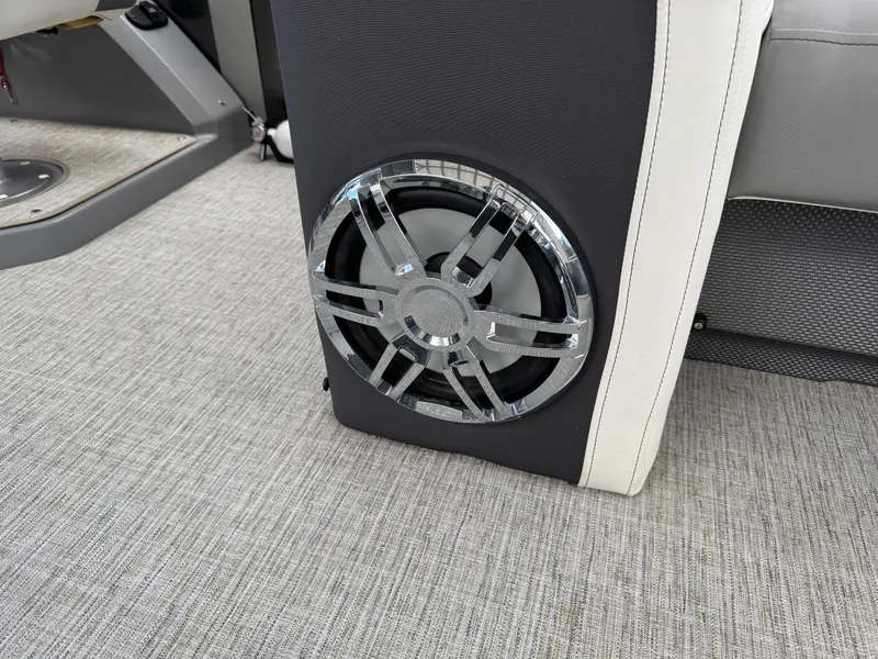 Slide: The Image of 2023 Godfrey Monaco 255 SD boat speaker on gray carpeted floor. - 20