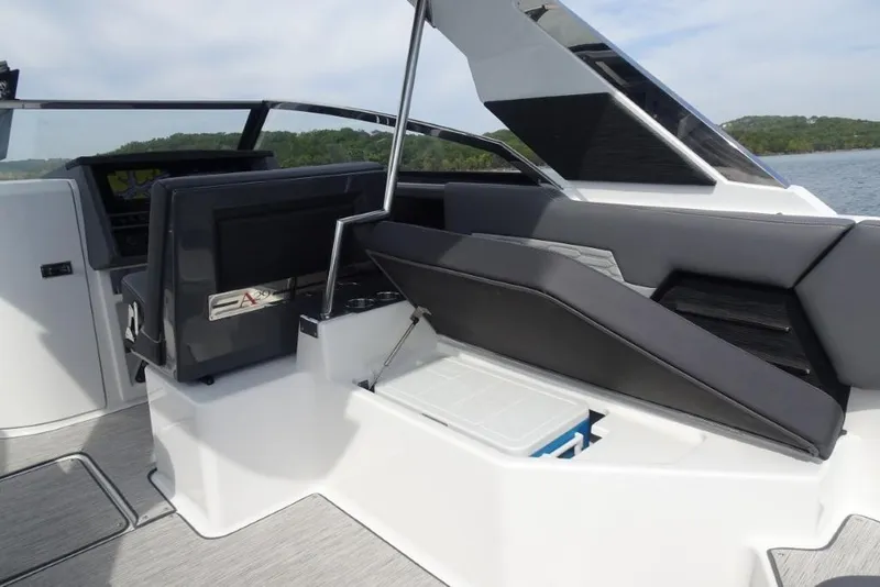 Slide: The Image of 2026 Cobalt A29 boat interior with sleek seating and modern dashboard design. - 14