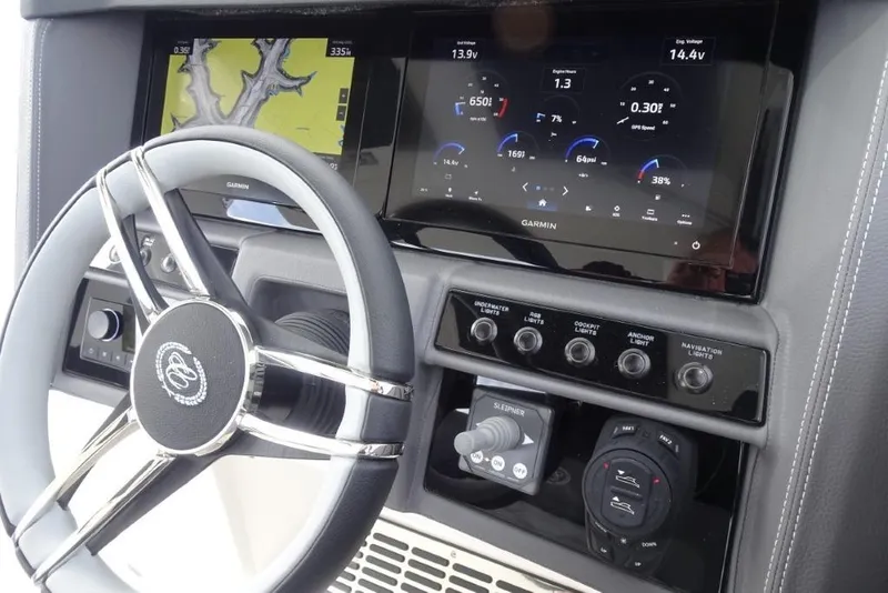 Slide: The Image of 2026 Cobalt A29 dashboard with Garmin display and steering wheel controls. - 18