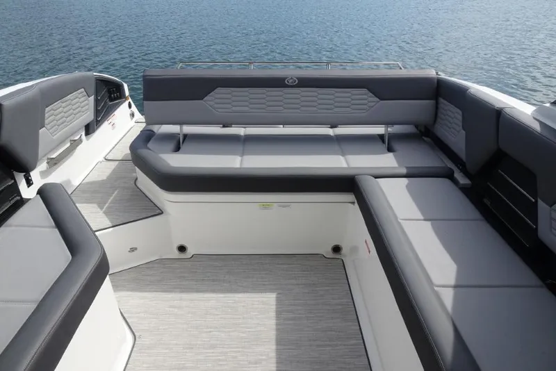 Slide: The Image of Luxurious seating area on 2026 Cobalt A29 boat, featuring sleek gray upholstery and modern design. - 28