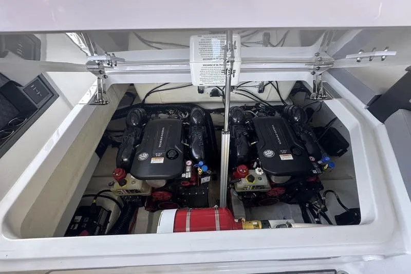 Slide: The Image of 2024 Cobalt R35 engine compartment with dual engines and fire extinguisher. - 8