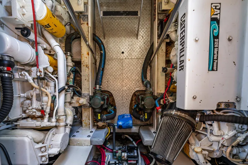 Slide: The Image of Engine room of a 2001 Silverton 410 Sport Bridge with Caterpillar marine power. - 28