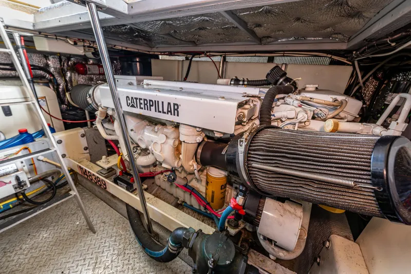 Slide: The Image of Engine room of 2001 Silverton 410 Sport Bridge with Caterpillar engine. - 32