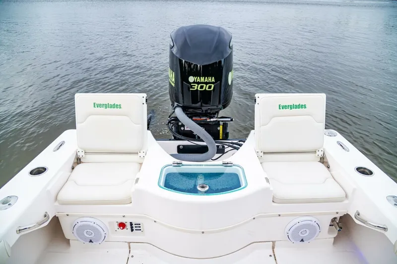 Slide: The Image of 2018 Everglades 243 Center Console boat with Yamaha 300 engine on calm water. - 27