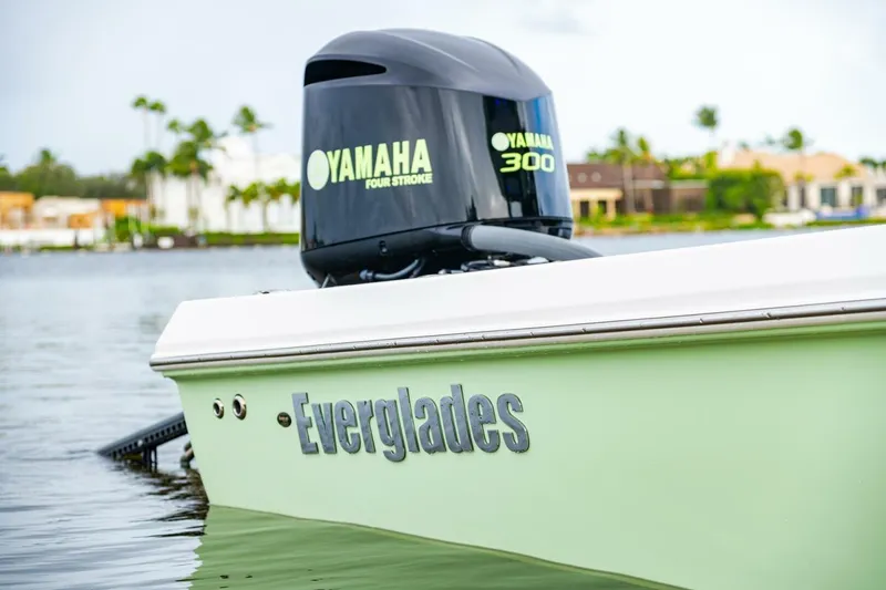 Slide: The Image of 2018 Everglades 243 Center Console boat with Yamaha 300 engine on water. - 36