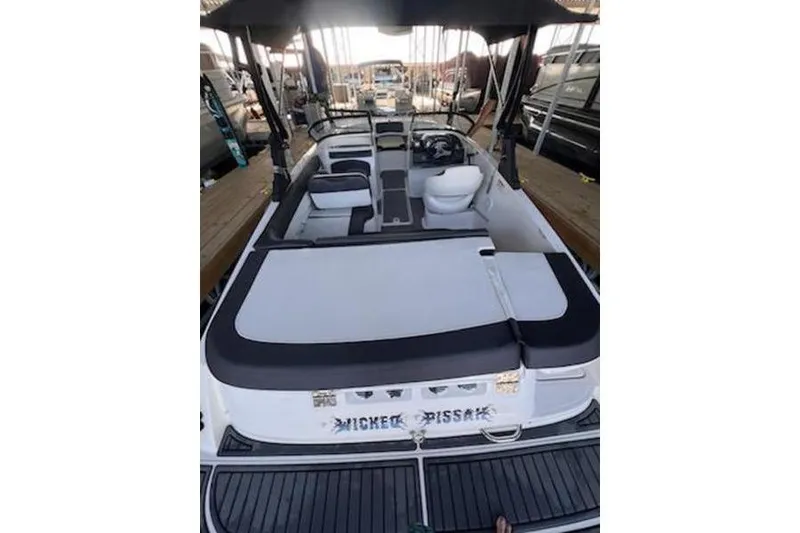 Slide: The Image of 2021 Bayliner VR5 Cuddy engine compartment with visible battery and components. - 10