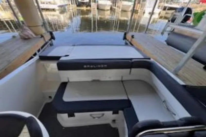 Slide: The Image of 2021 Bayliner VR5 Cuddy dashboard with steering wheel and instrument panel. - 12