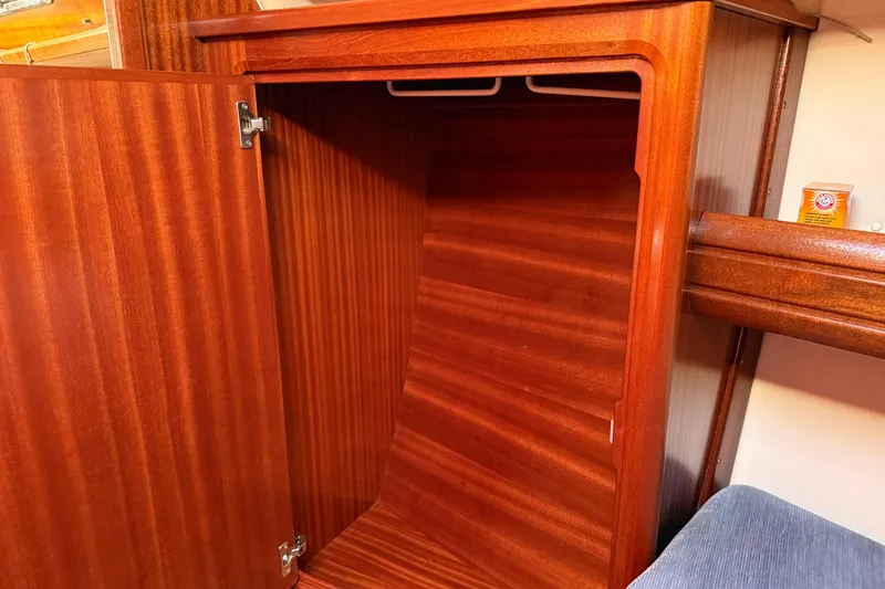 Slide: The Image of Wooden closet interior on a 2002 Bavaria 37 Sloop yacht. - 20