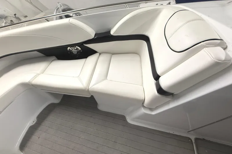 Slide: The Image of 2013 Formula 310 Bowrider interior with white cushioned seating. - 10