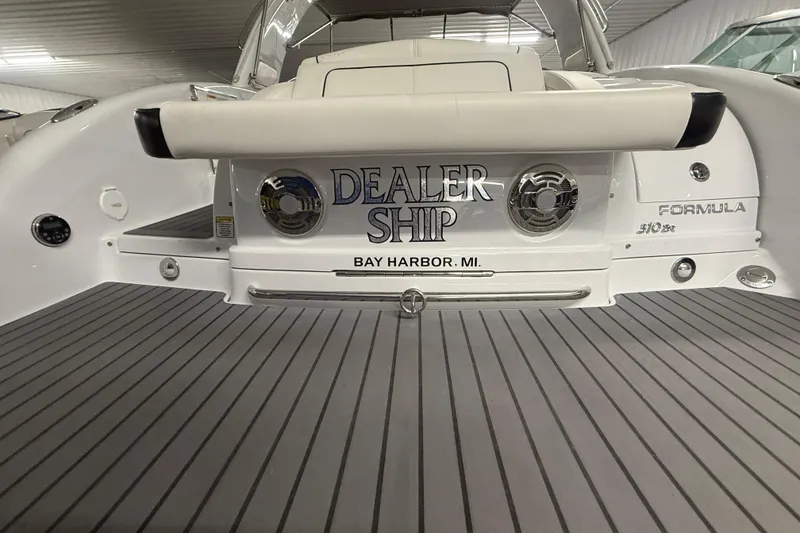 Slide: The Image of 2013 Formula 310 Bowrider boat stern with "Dealer Ship" and "Bay Harbor, MI" text. - 5