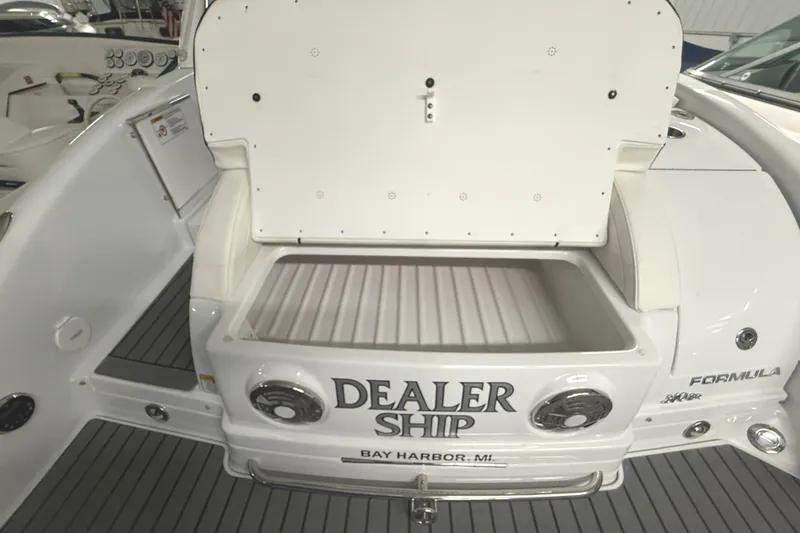 Slide: The Image of 2013 Formula 310 Bowrider boat with open storage compartment, Bay Harbor, MI. - 6