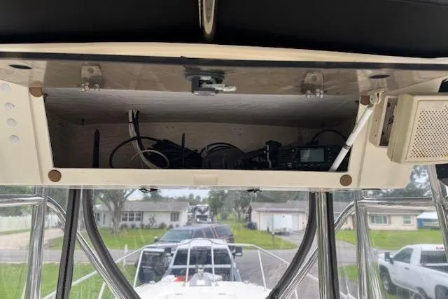 Slide: The Image of 1997 Sea Cat 255 boat dashboard with electronic equipment and wiring. - 17