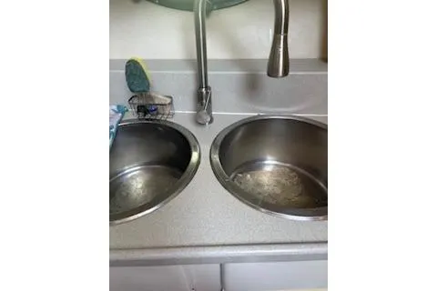 Slide: The Image of Stainless steel double sink in 1990 Californian 45 Motor Yacht kitchen area. - 26