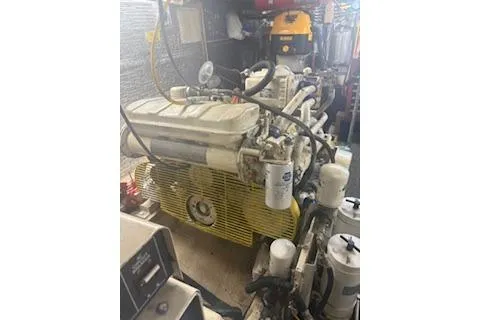 Slide: The Image of Engine room of 1990 Californian 45 Motor Yacht with visible machinery and components. - 35