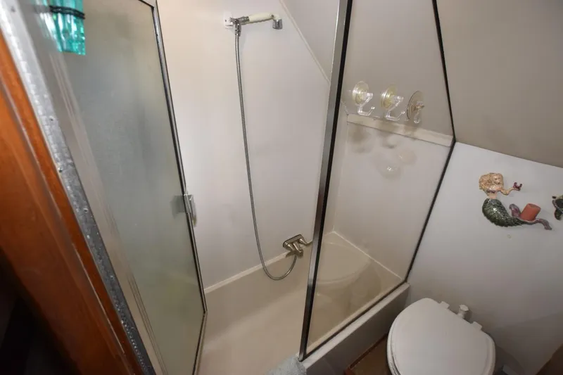 Slide: The Image of Bathroom of 1990 Californian 45 Motor Yacht with shower and toilet. - 50