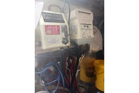 Slide: The Image of Engine room of 1990 Californian 45 Motor Yacht with equipment and wiring. - 74