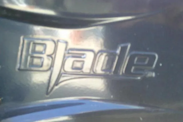 Slide: The Image of Blade logo on 2023 Carolina Skiff 26 Ultra Elite boat. - 11
