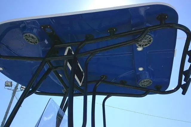Slide: The Image of 2023 Carolina Skiff 26 Ultra Elite boat canopy with speakers and blue finish. - 14