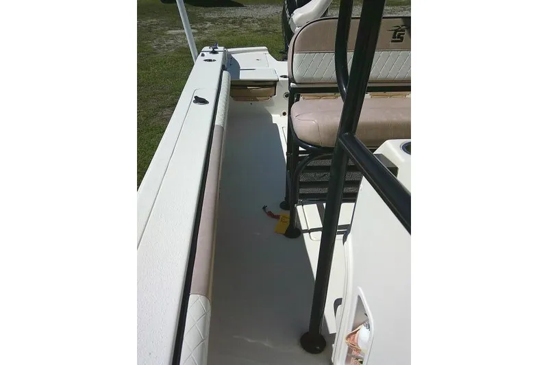 Slide: The Image of 2023 Carolina Skiff 26 Ultra Elite boat interior with seating and railing details. - 28