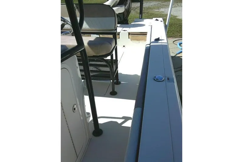 Slide: The Image of 2023 Carolina Skiff 26 Ultra Elite boat interior with seating and console. - 29