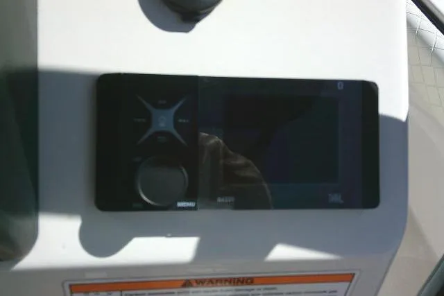 Slide: The Image of Control panel on 2023 Carolina Skiff 26 Ultra Elite boat dashboard. - 37