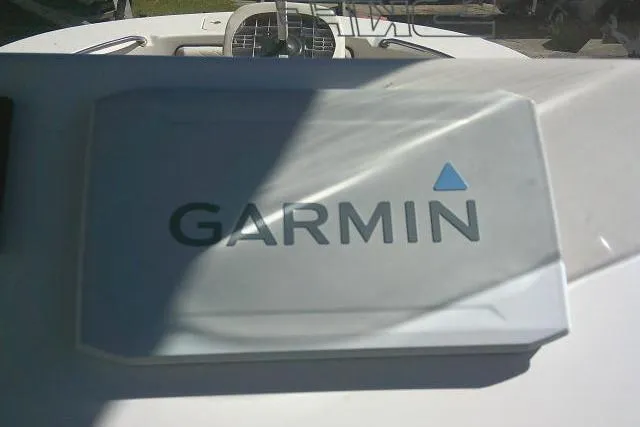 Slide: The Image of Garmin device on 2023 Carolina Skiff 26 Ultra Elite boat dashboard. - 38