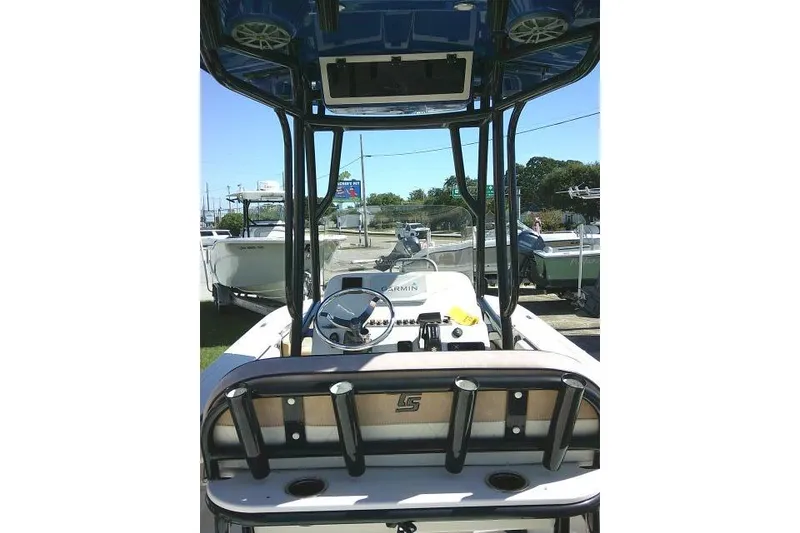 Slide: The Image of 2023 Carolina Skiff 26 Ultra Elite boat interior with steering console and seating. - 48