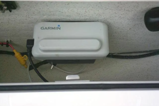 Slide: The Image of Garmin device installed in 2023 Carolina Skiff 26 Ultra Elite boat compartment. - 52