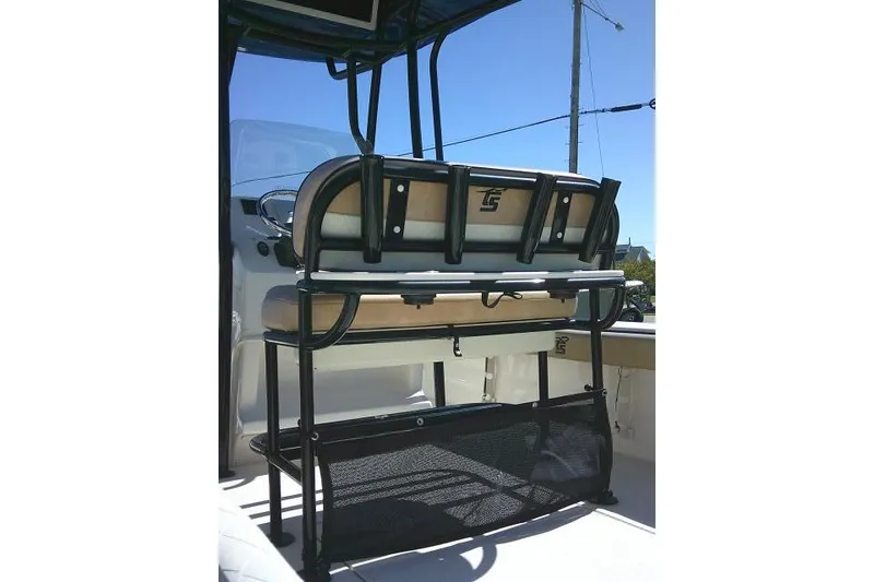 Slide: The Image of 2023 Carolina Skiff 26 Ultra Elite boat interior with seating and storage. - 55