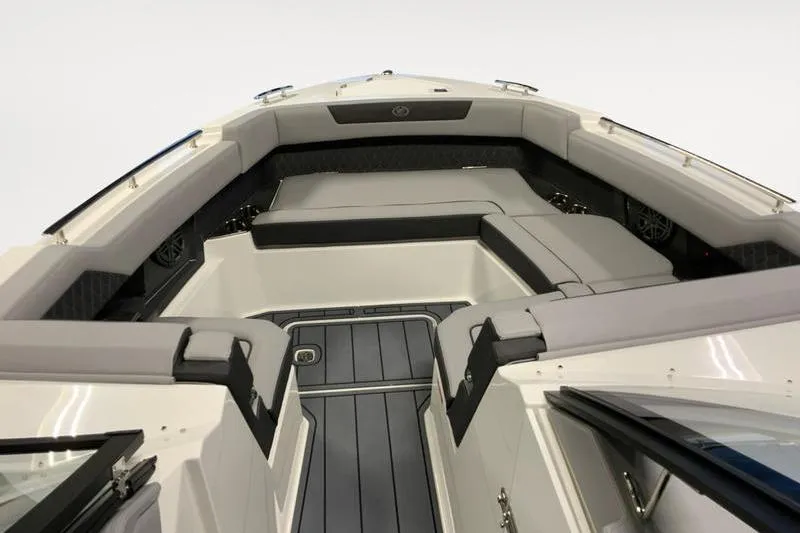 Slide: The Image of 2026 Cobalt R31 boat interior with modern dashboard and luxurious seating. - 11