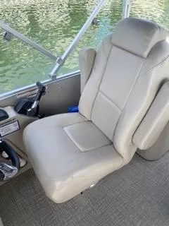 Slide: The Image of 2022 Avalon Catalina Entertainer boat seat, beige leather, near water. - 12