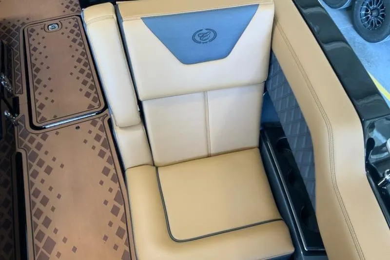 Slide: The Image of 2026 Cobalt R31 Surf boat interior with tan leather seating and diamond-patterned flooring. - 22