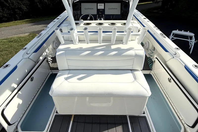 Slide: The Image of 2017 Nor-Tech 392 Superfish boat interior with white seating and rod holders. - 12