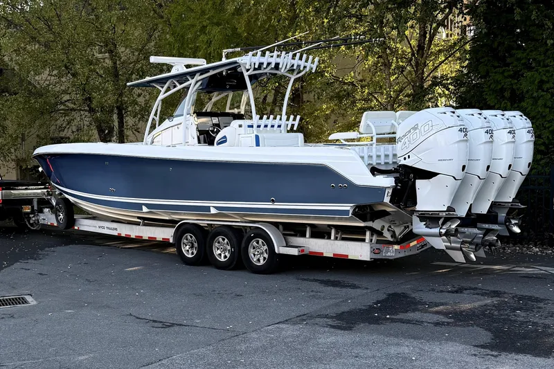 Slide: The Image of 2017 Nor-Tech 392 Superfish boat on trailer with multiple outboard engines. - 4