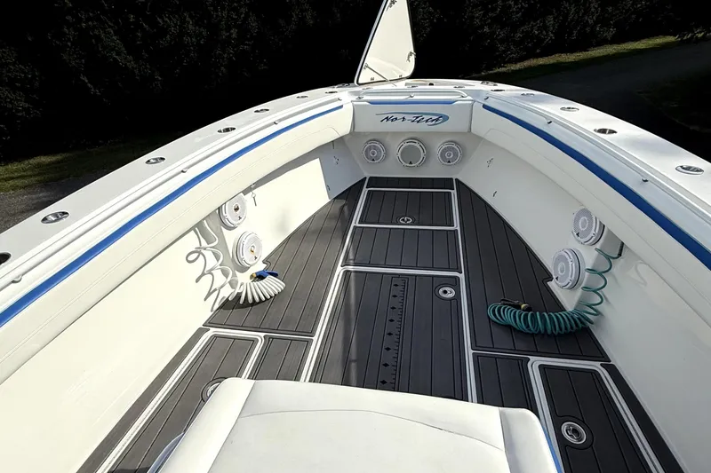 Slide: The Image of 2017 Nor-Tech 392 Superfish boat deck with sleek design and modern features. - 6