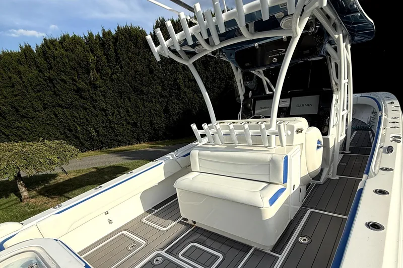 Slide: The Image of 2017 Nor-Tech 392 Superfish boat interior with seating and rod holders. - 8
