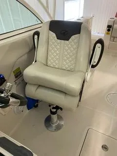 Slide: The Image of Luxurious captain's chair in 2022 Sailfish 245DC boat interior. - 20