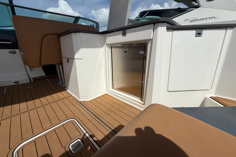 Slide: The Image of 2022 Aviara AV32 OB boat interior with teak flooring and sleek cabinetry. - 10
