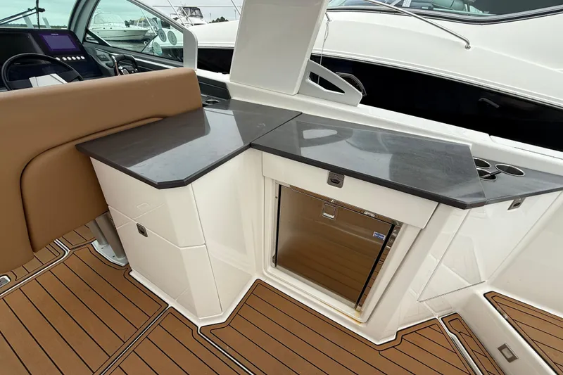 Slide: The Image of 2022 Aviara AV32 OB boat interior with sleek countertop and modern design. - 11