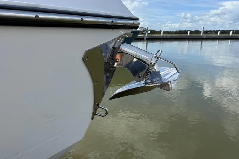Slide: The Image of 2022 Aviara AV32 OB boat anchor detail by the water. - 22
