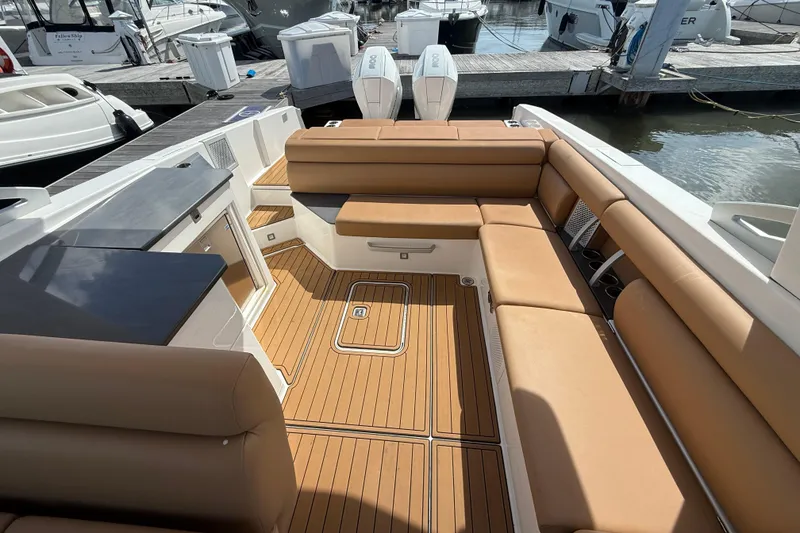 Slide: The Image of Luxurious 2022 Aviara AV32 OB boat interior with tan seating and sleek design. - 9