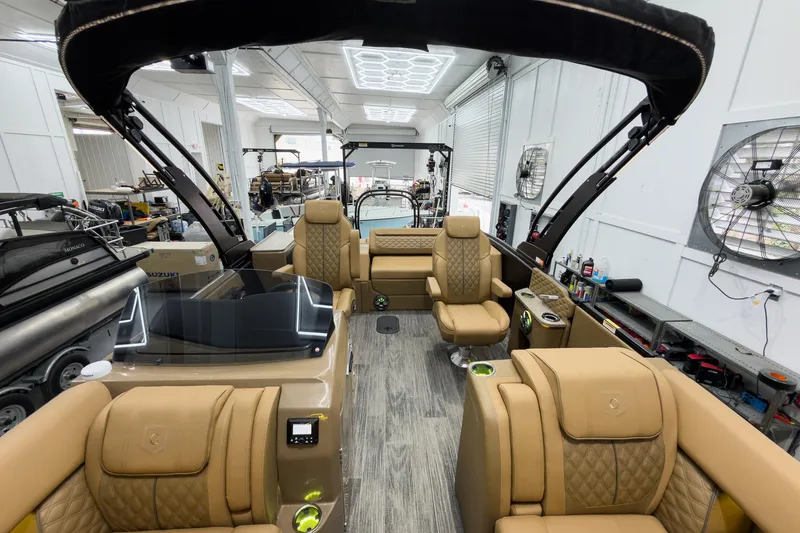 Slide: The Image of Luxurious interior of 2026 Godfrey Sanpan 25' Tritoon with plush seating and modern amenities. - 20