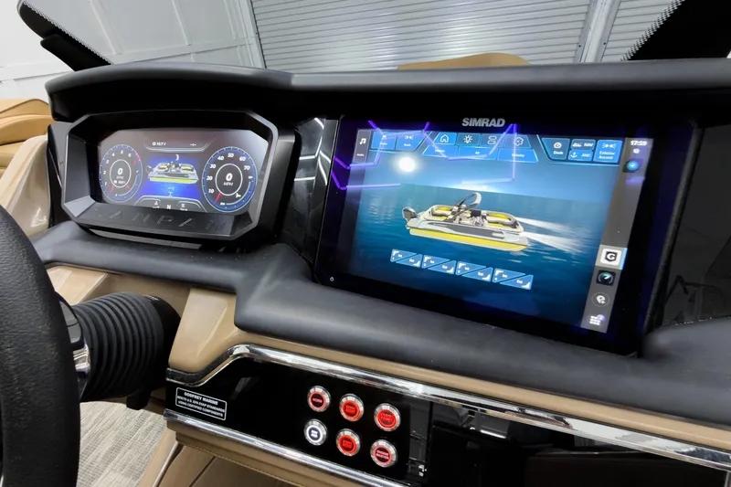 Slide: The Image of Dashboard of 2026 Godfrey Sanpan 25' Tritoon with digital displays and controls. - 27