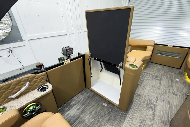 Slide: The Image of Interior of 2026 Godfrey Sanpan 25' Tritoon with flip lounge and modern amenities. - 31