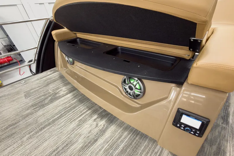 Slide: The Image of 2026 Godfrey Sanpan 25' Tritoon lounge with speakers and storage compartments. - 42