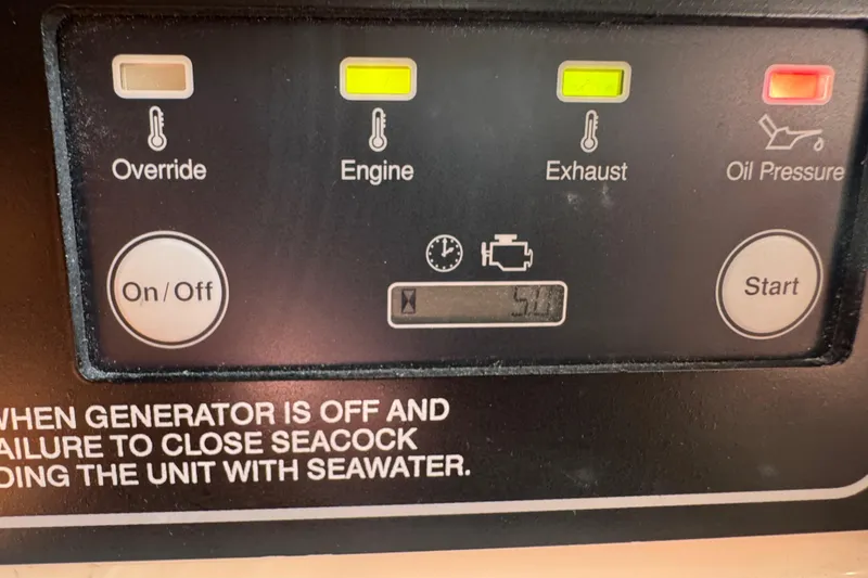Slide: The Image of Electrical control panel on 2024 Grady-White Marlin 300 boat, showing AC and DC switches. - 15