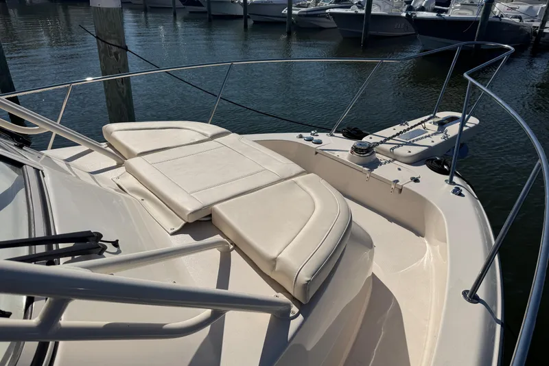 Slide: The Image of 2024 Grady-White Marlin 300 boat deck with anchor chain and railing. - 29