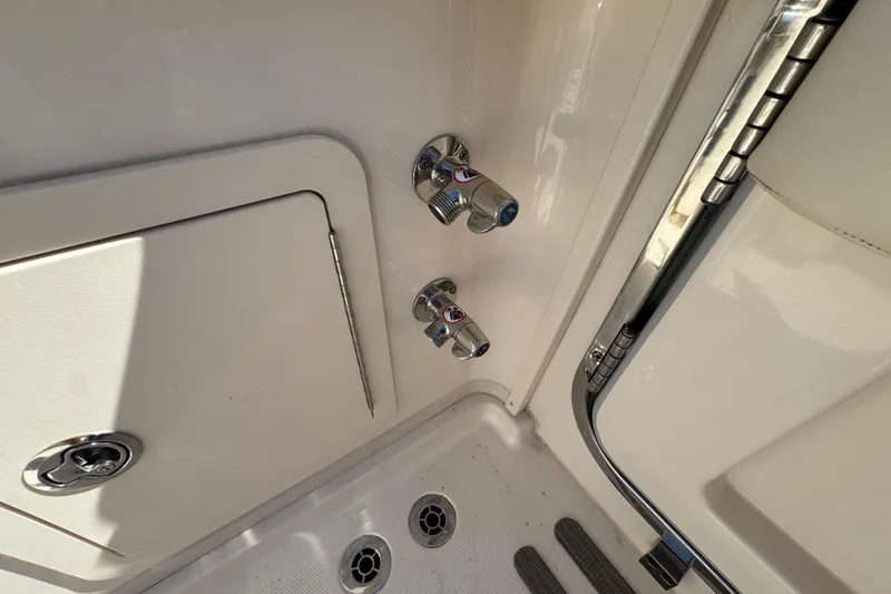 Slide: The Image of 2024 Grady-White Marlin 300 dual battery switch panel with operation instructions. - 47