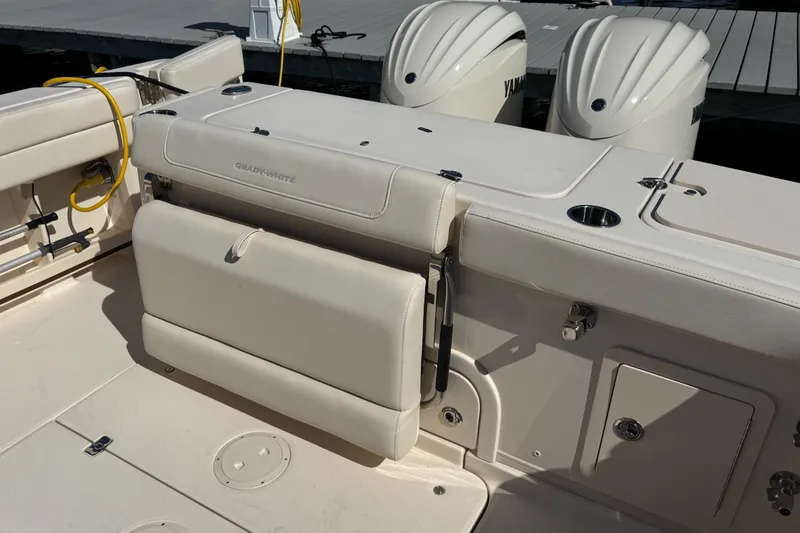 Slide: The Image of 2024 Grady-White Marlin 300 boat interior with shower controls and drainage. - 48